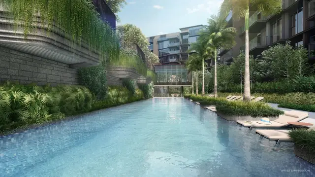 50-metre lap pool bordered by palms and greenery
